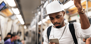 african man in a train
